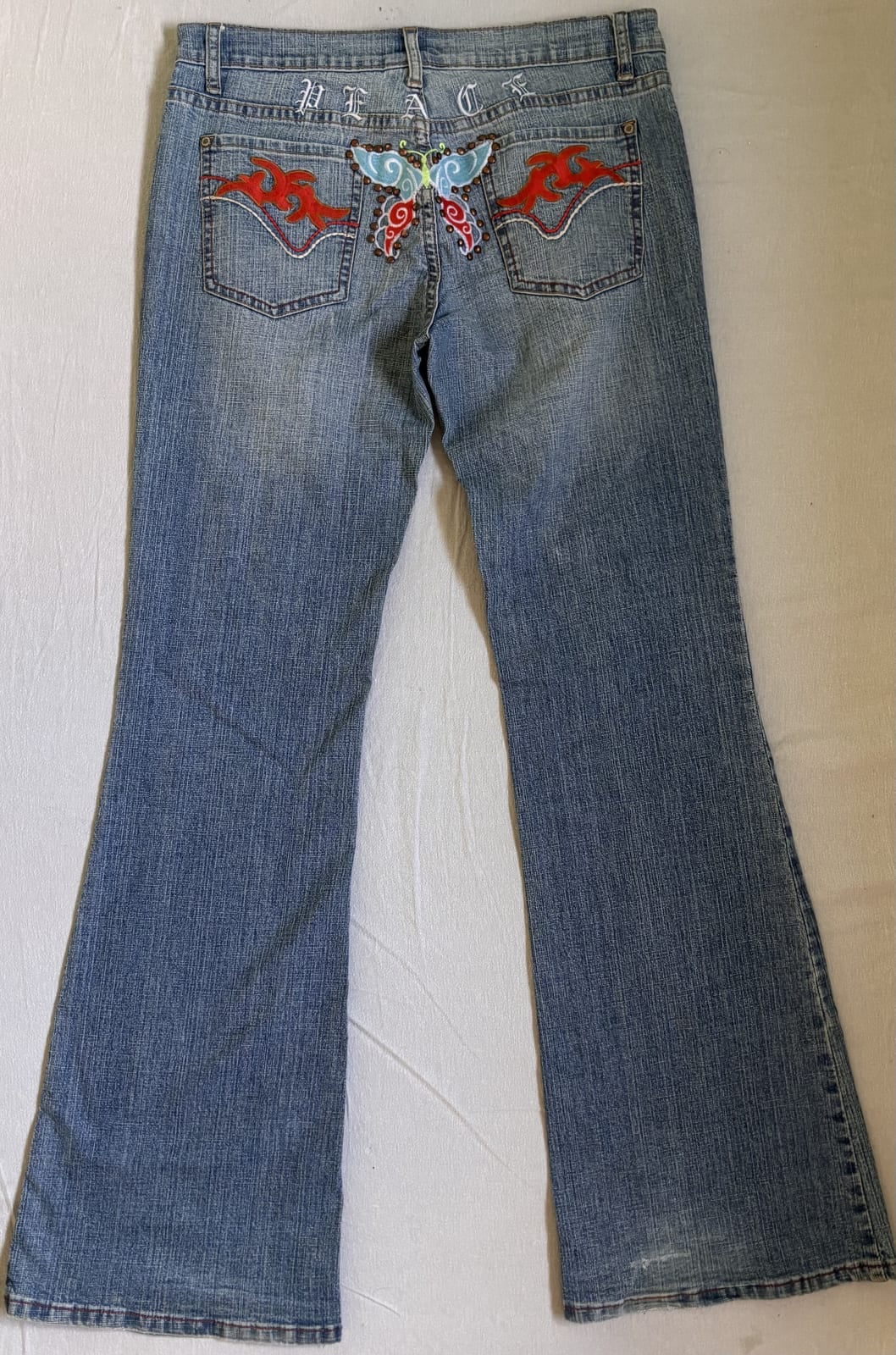 Authentic Clothing Company flared jeans with embroidered butterfly and studs, 44/34, Blue, size UK 12